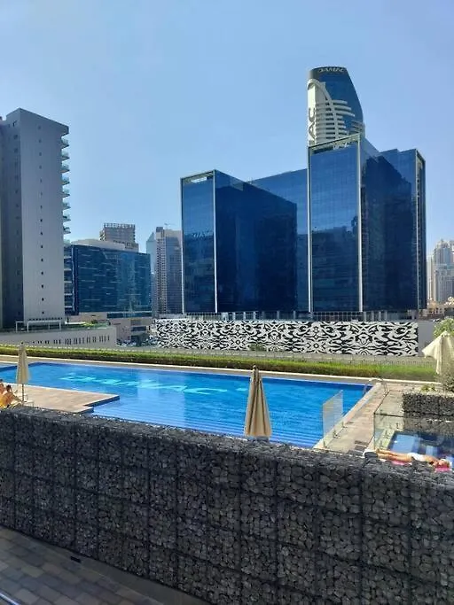 Cozy 2Br Apartment Damac Vera Business Bay contacts